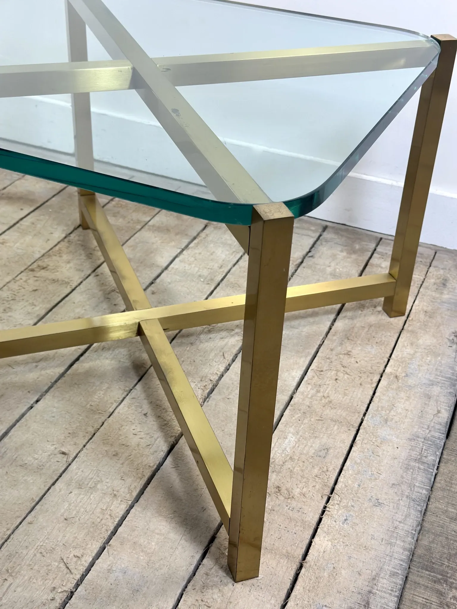 Pair of Italian brass and glass side tables from the 1970s.