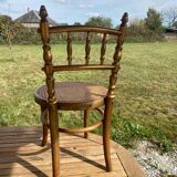 Children's chair in cane and curved wood