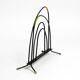 Mid Century newspaper and magazine stand made of iron with brass details