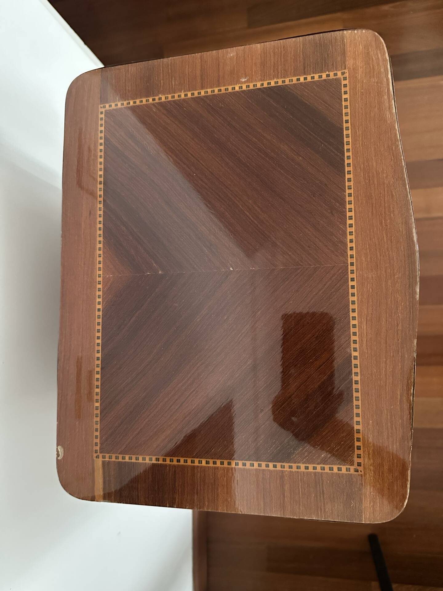 Small bedside table in marquetry in the Louis XV style.