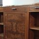 Low sideboard from the beginning of the twentieth century in walnut.