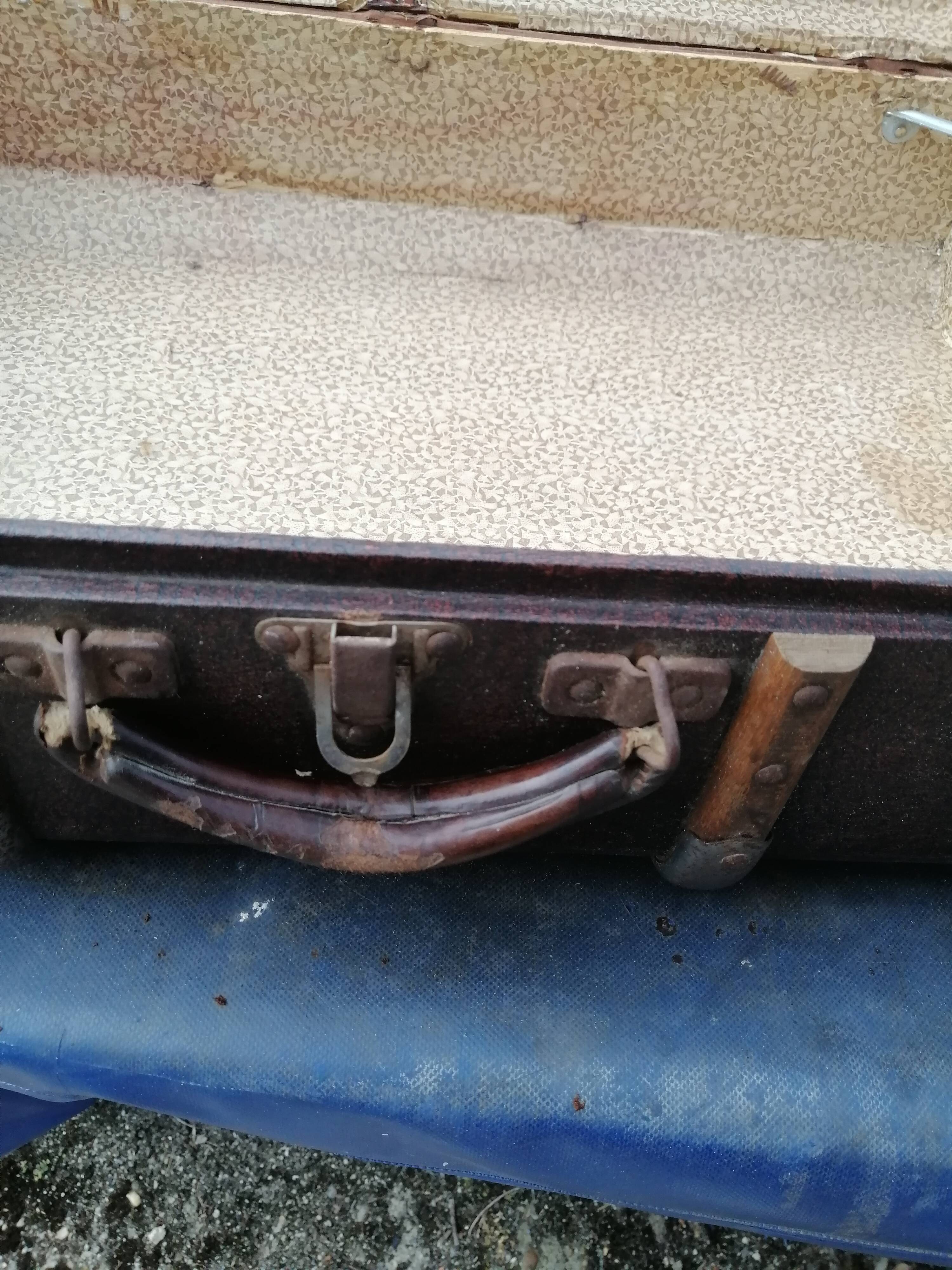 Antique suitcase in leather wood and vintage metal
