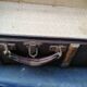 Antique suitcase in leather wood and vintage metal