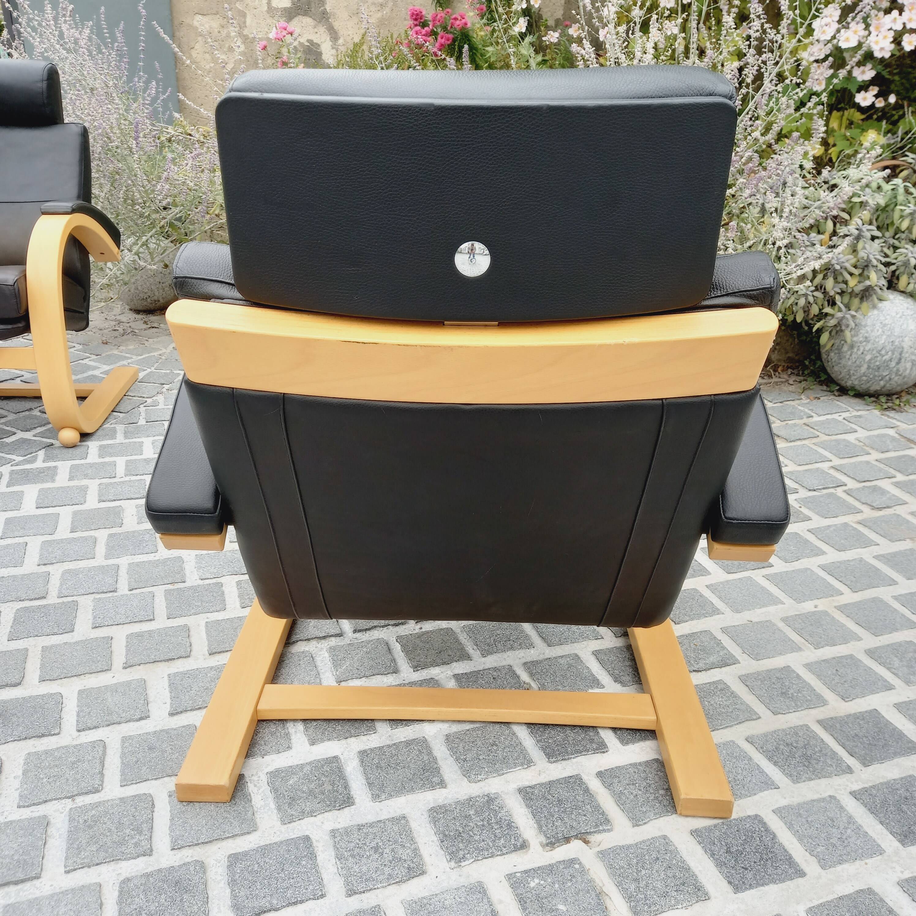 Pair of NELO Scandinavian armchairs