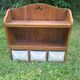 Wooden wall shelf and tiled drawers