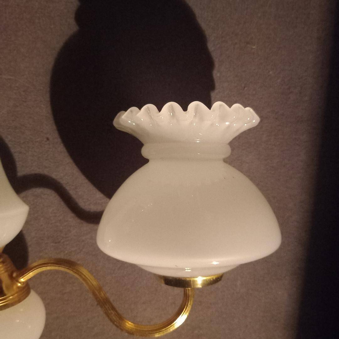 brass and white opaline wall lights