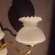 brass and white opaline wall lights