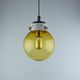 Vintage Mid-Century Modern Industrial Amber Glass And Brass Metal Lamp