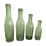 Set of 4 old thick glass bottles