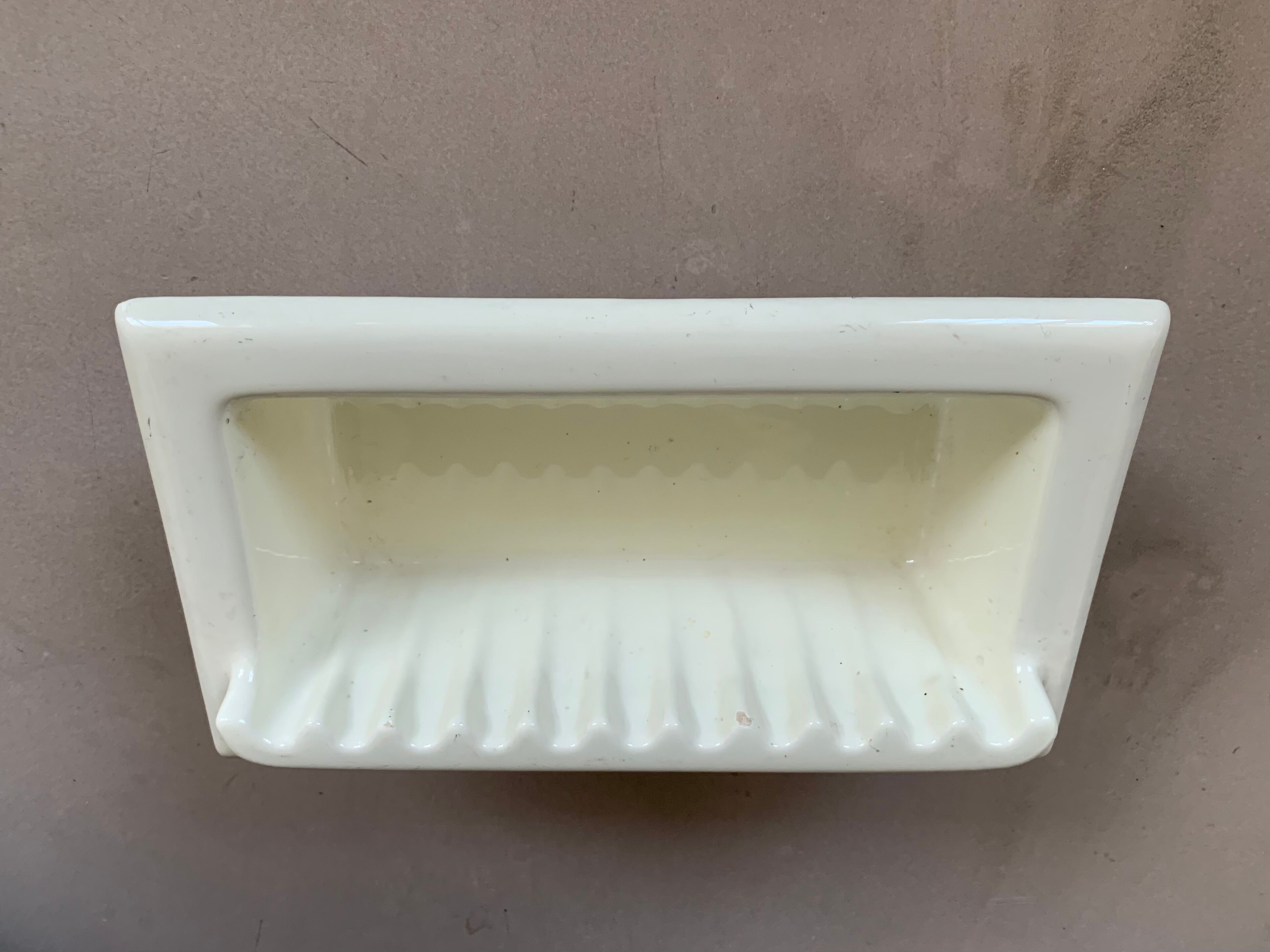 Wall mounted soap holder