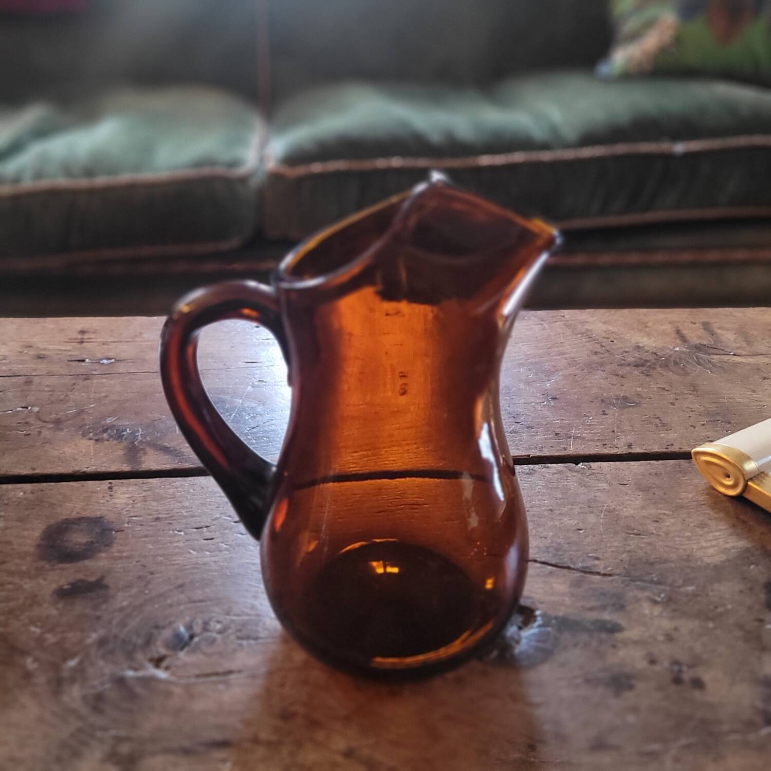 Dark amber glass pitcher – 1960s