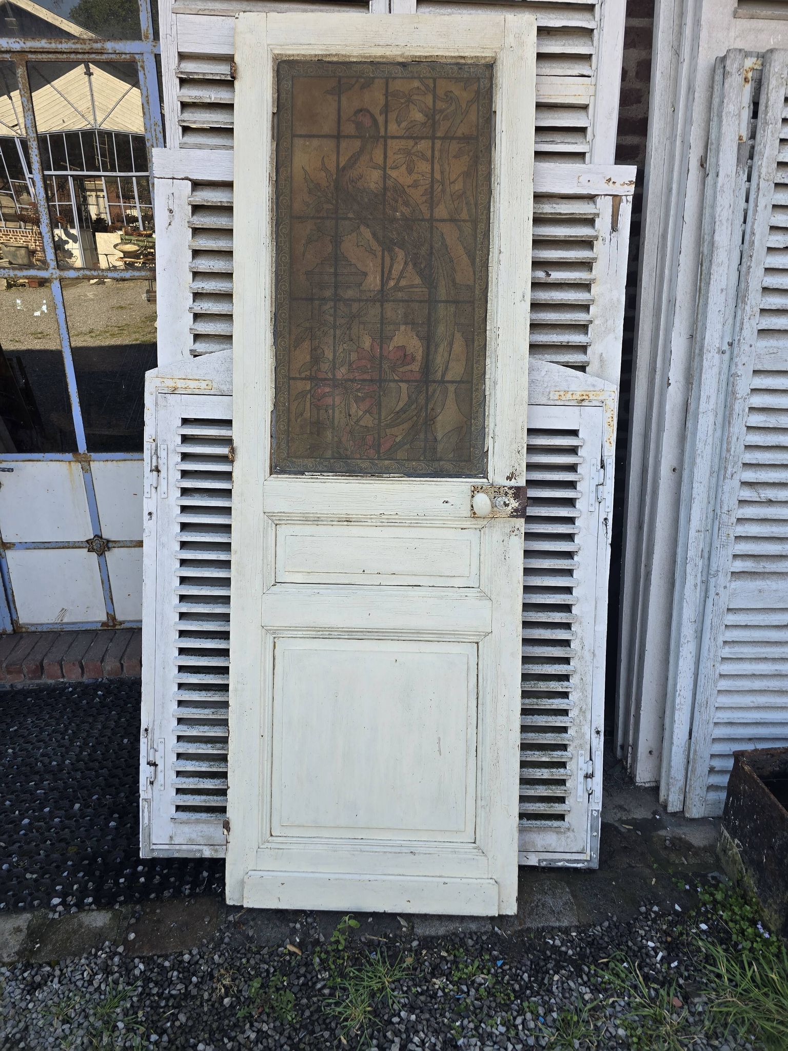 old door with decorated window