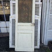 old door with decorated window