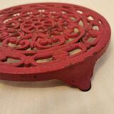 Burgundy cast iron trivet