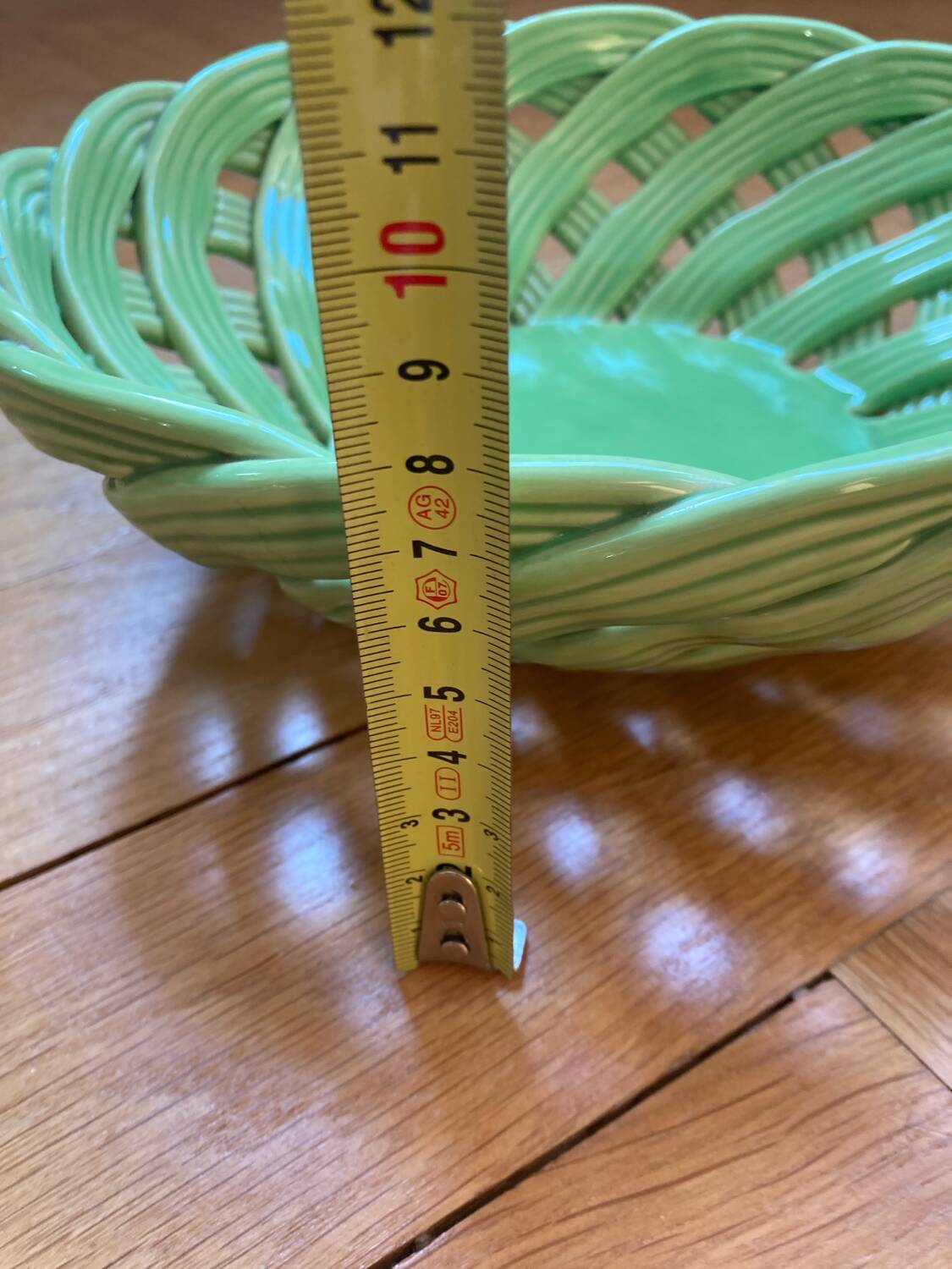 Green woven ceramic basket