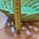 Green woven ceramic basket