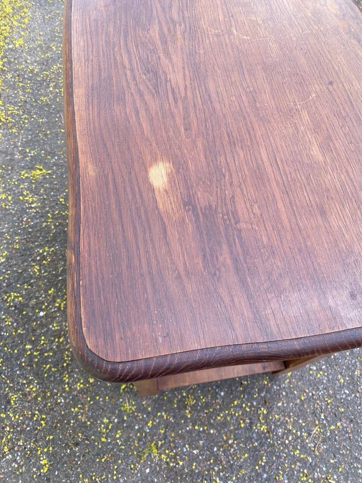 Vintage farmhouse dessert trolley on wheels made of solid wood from the 19th century.