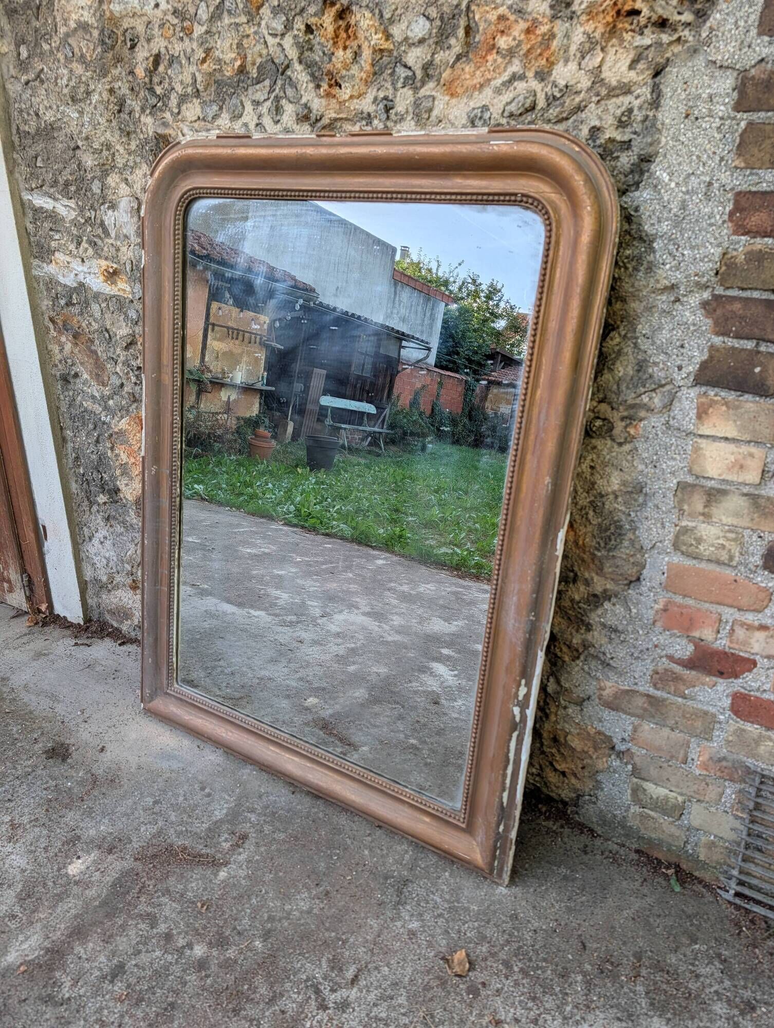 Antique Louis-Philippe trumeau gilded with beaded moulding & lovely patina