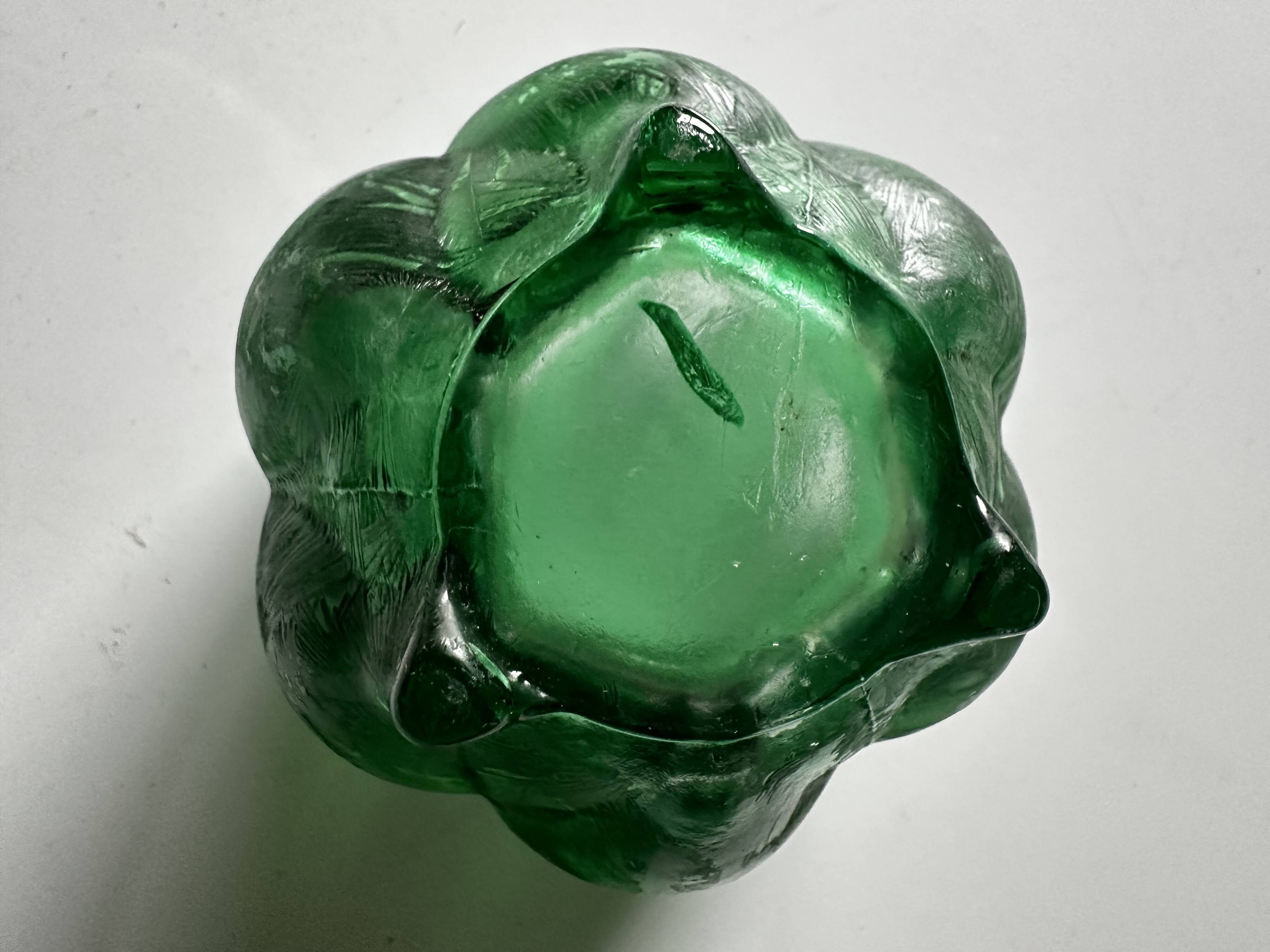 Green glass paste emptying cup from the Art Deco period