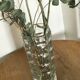 Multi-faceted moulded glass vase.
