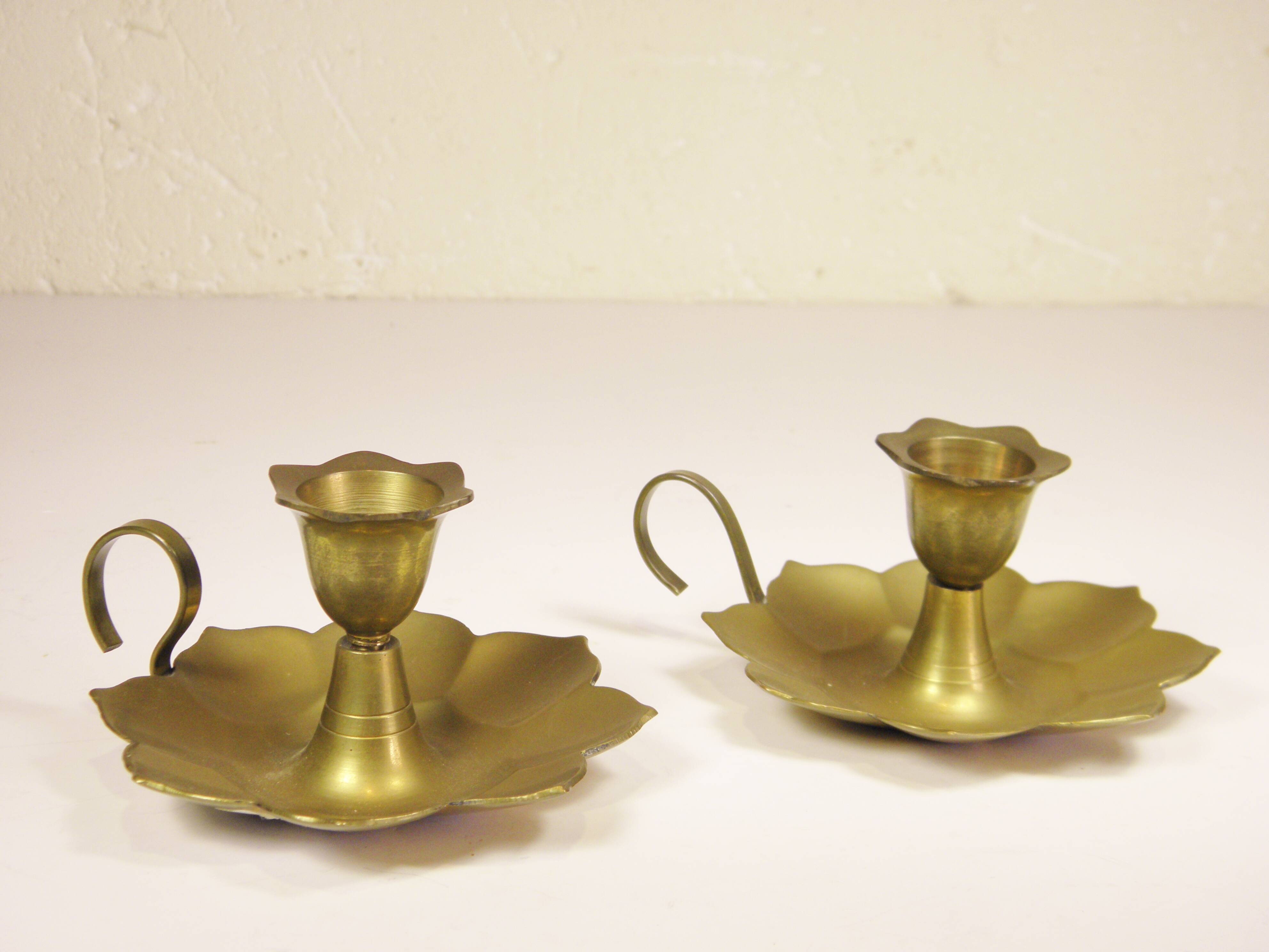 Pair of brass "flower" candlesticks