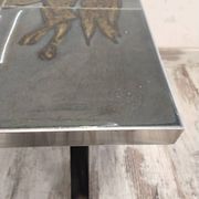 Table basse années 70 à décor de chevaux