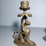 Pair of bronze hand candlesticks decorated with chimeras 19th century