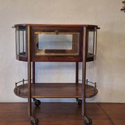Serving trolley / bar cart in mahogany, brass and glass, 1920