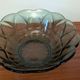 Vintage green smoked glass coupe with geometric decoration.