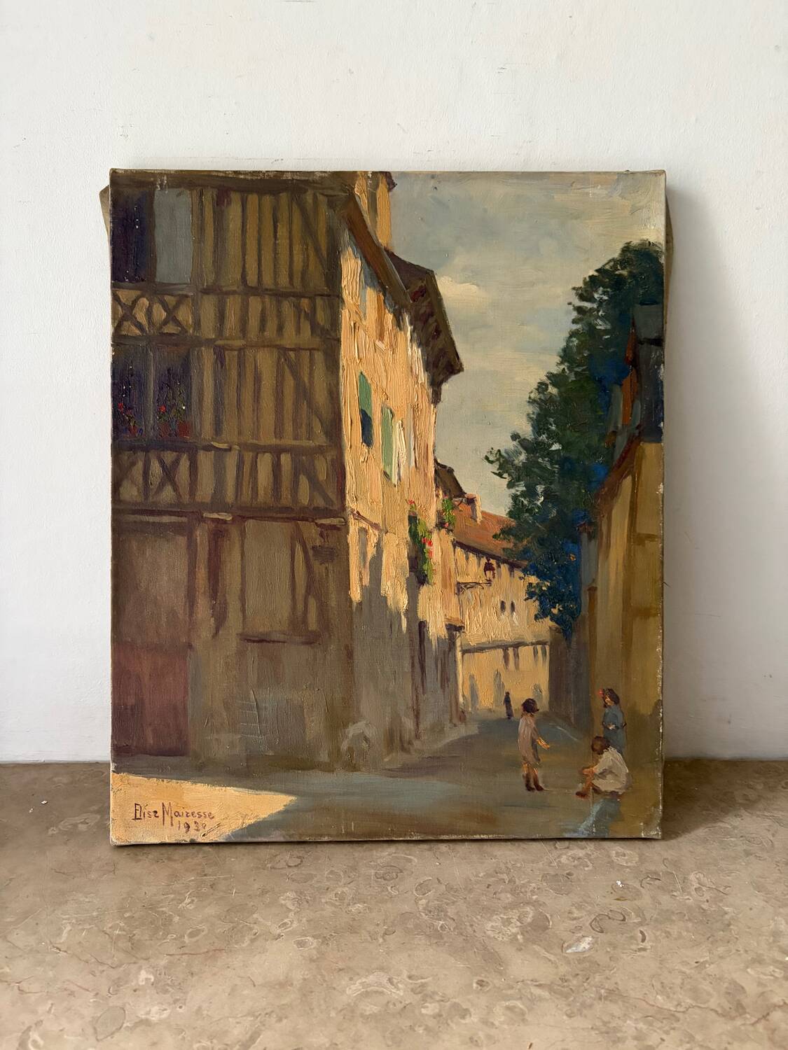Sunny street scene, oil on canvas signed 1930.