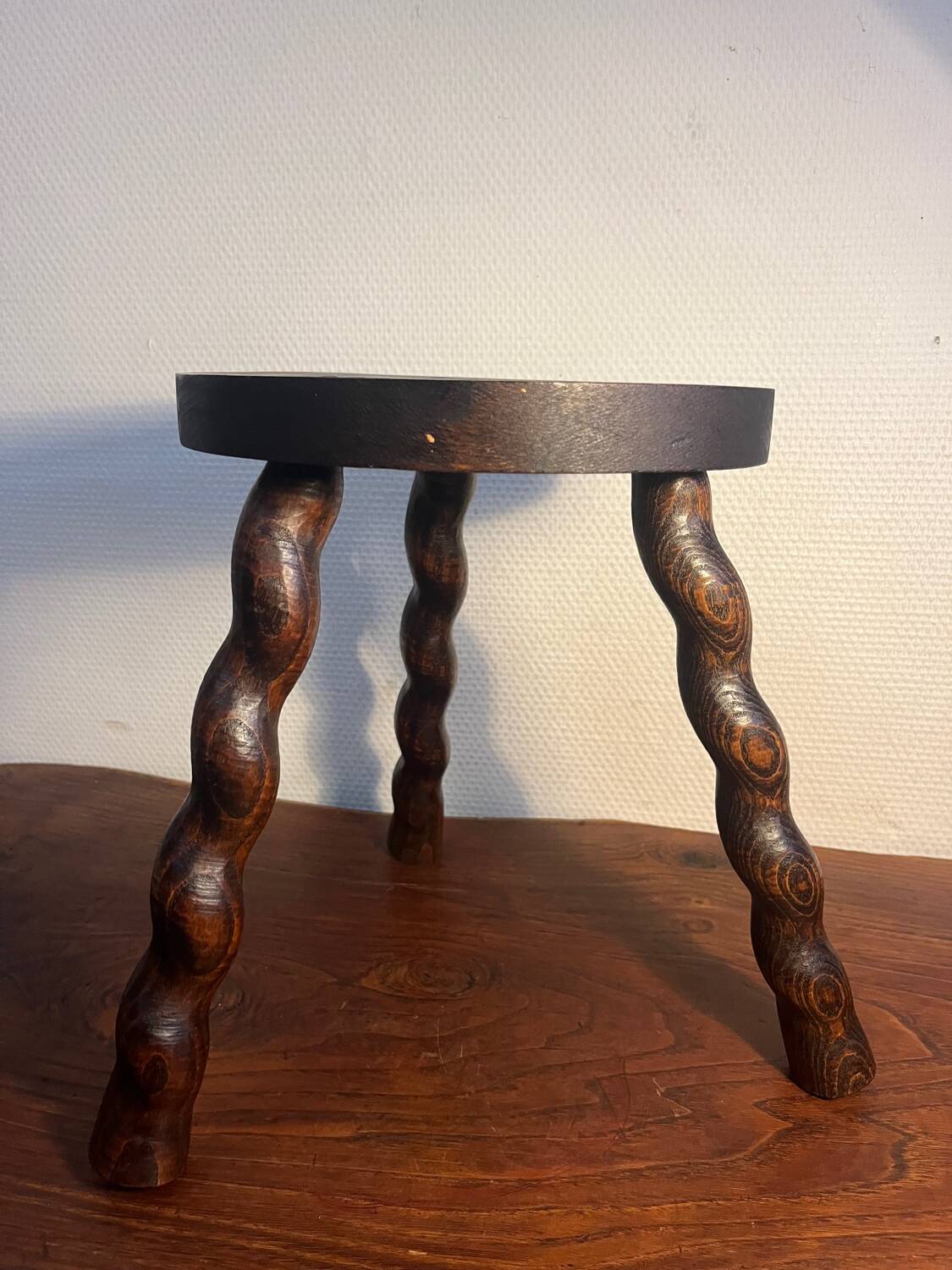 Round tripod stool with turned wooden legs
