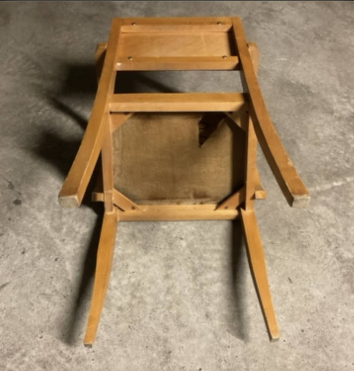 Club armchair with curved armrests known as "bridges" from the 1950s.