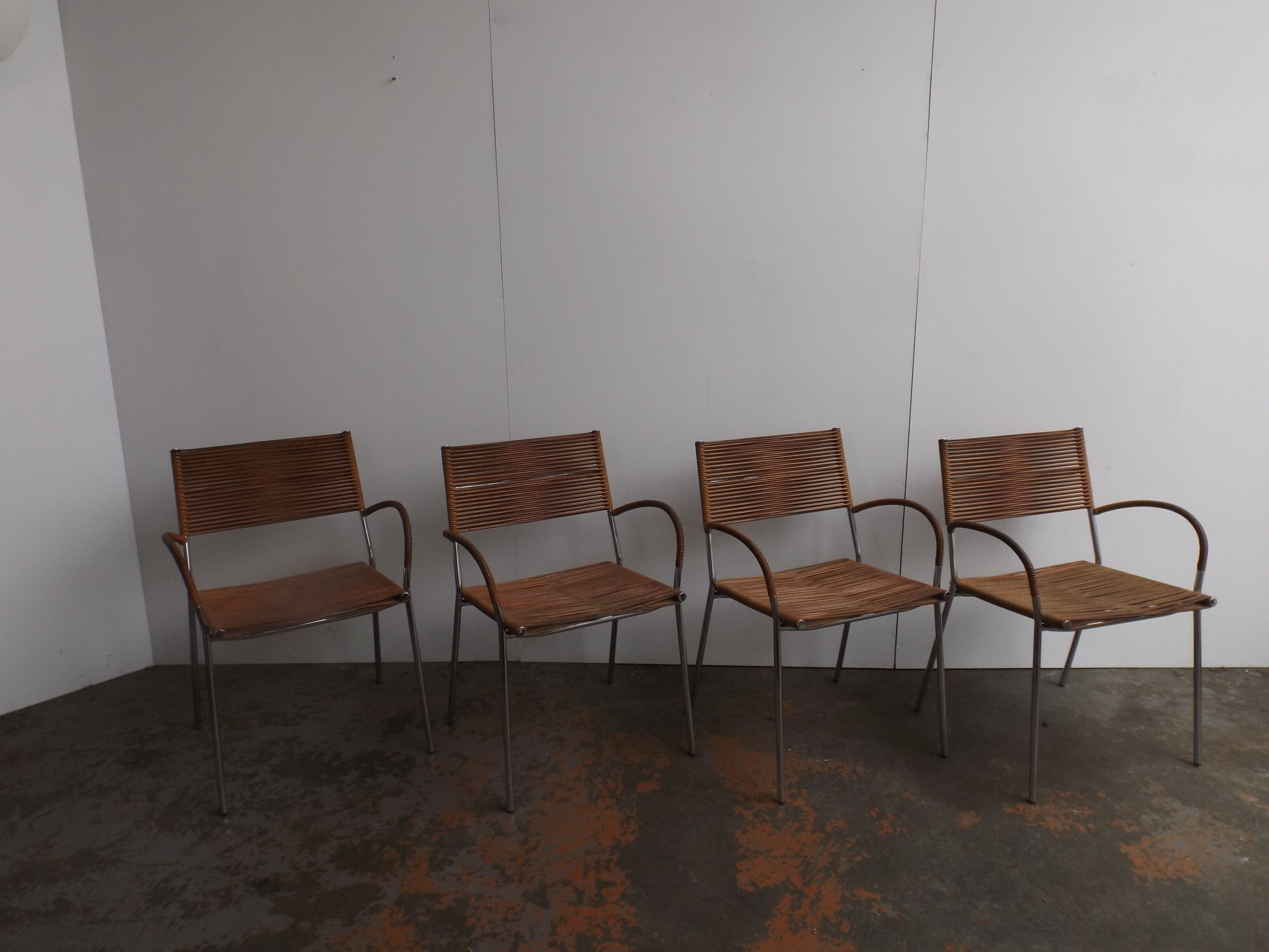 Set of 4 chairs by Tito Agnoli