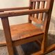 Old children's rocking chair in solid wood
