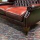 Chesterfield 2-seater leather-eared sofa from the 80s