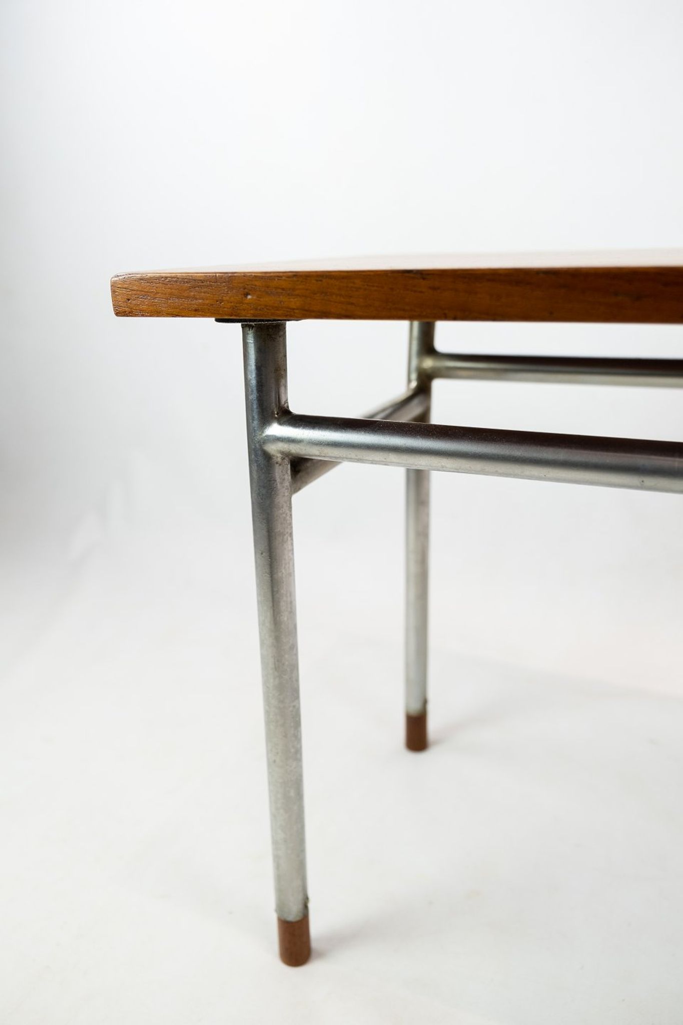 Coffee table in teak and legs in metal, designed by Hans J. Wegner, 1960s