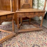 Pair of Renaissance style carved walnut armchairs