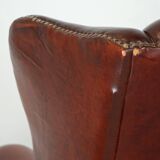 Large comfortable sheepleather wingchair in good condition and beautiful colours