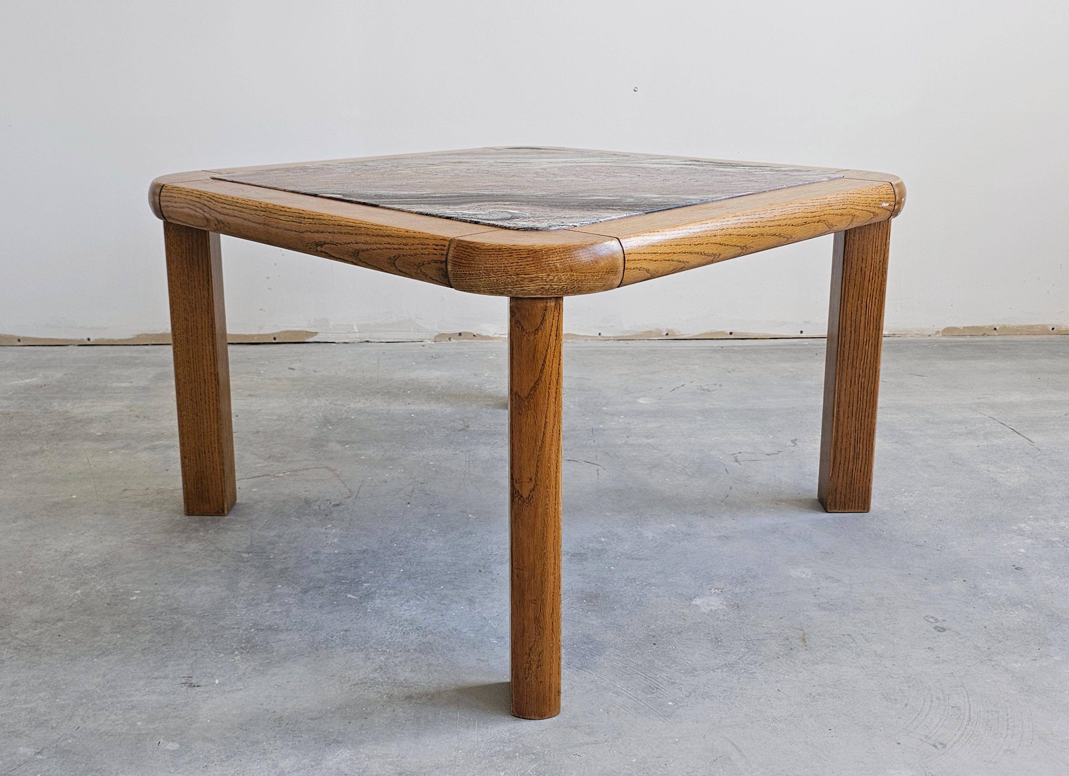 Brutalist coffee table in solid oak with a Rosso Luana marble top.
