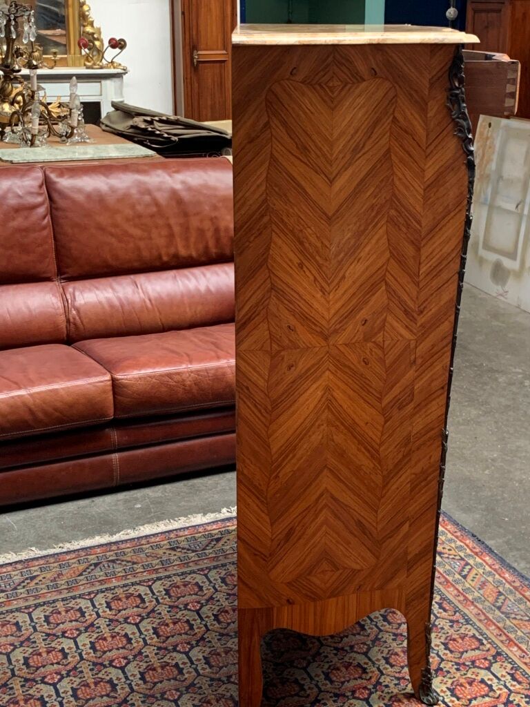 Old French secretary in bronze and wood marquetry.