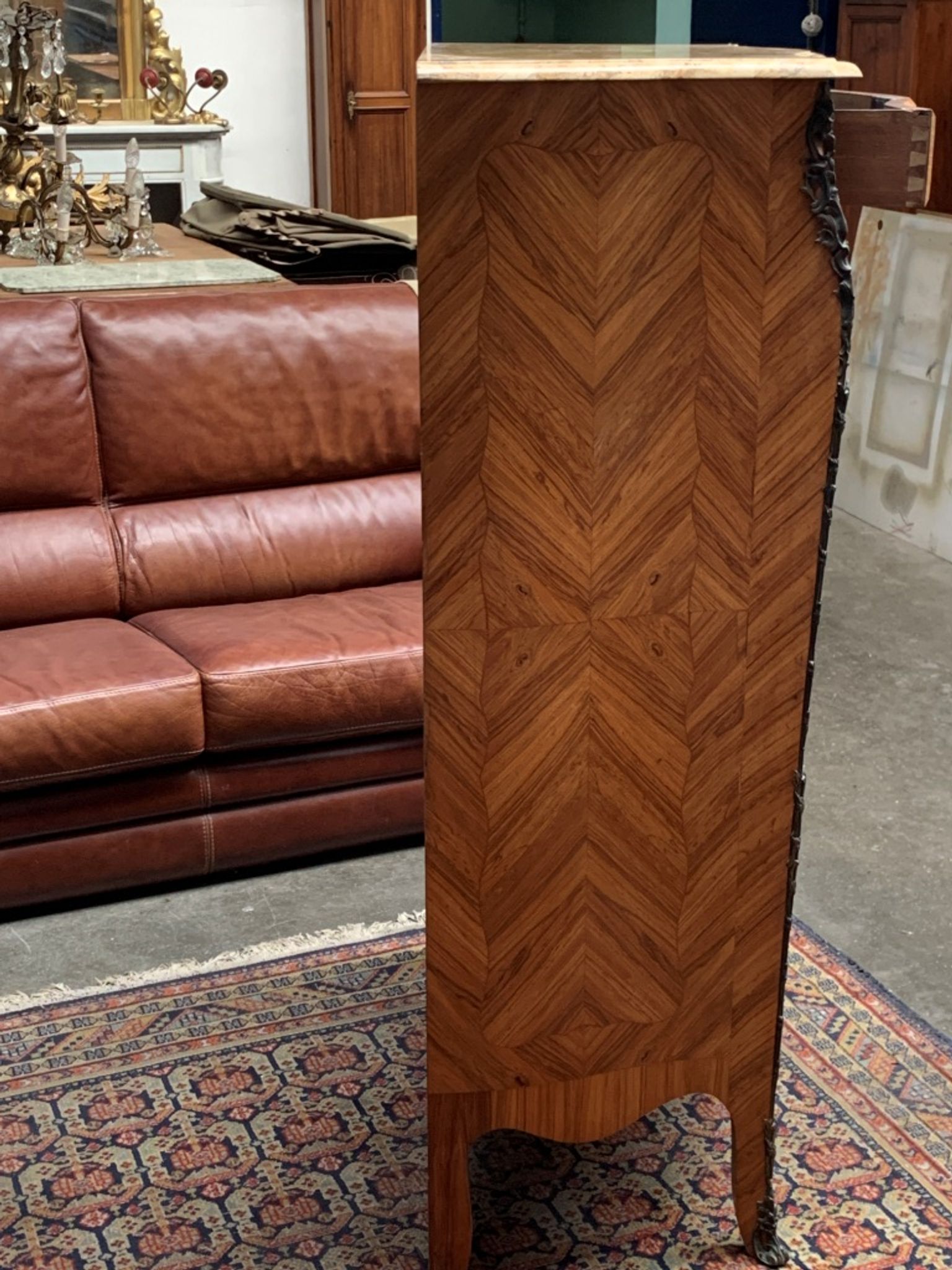 Old French secretary in bronze and wood marquetry.