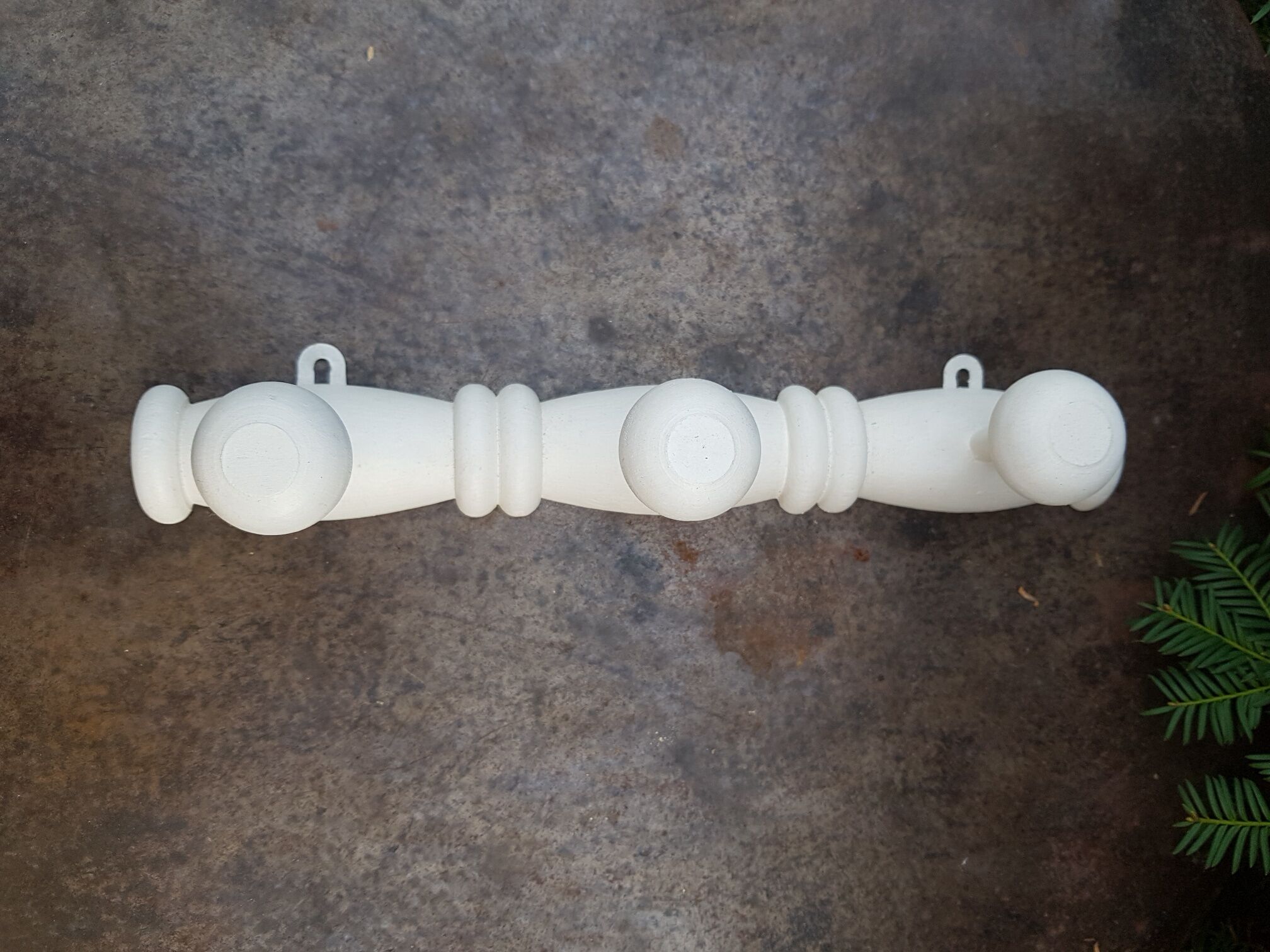 White wooden wall coat rack