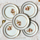 8 Petites assiettes en porcelaine OLYMPIA motif fleuris et dorure