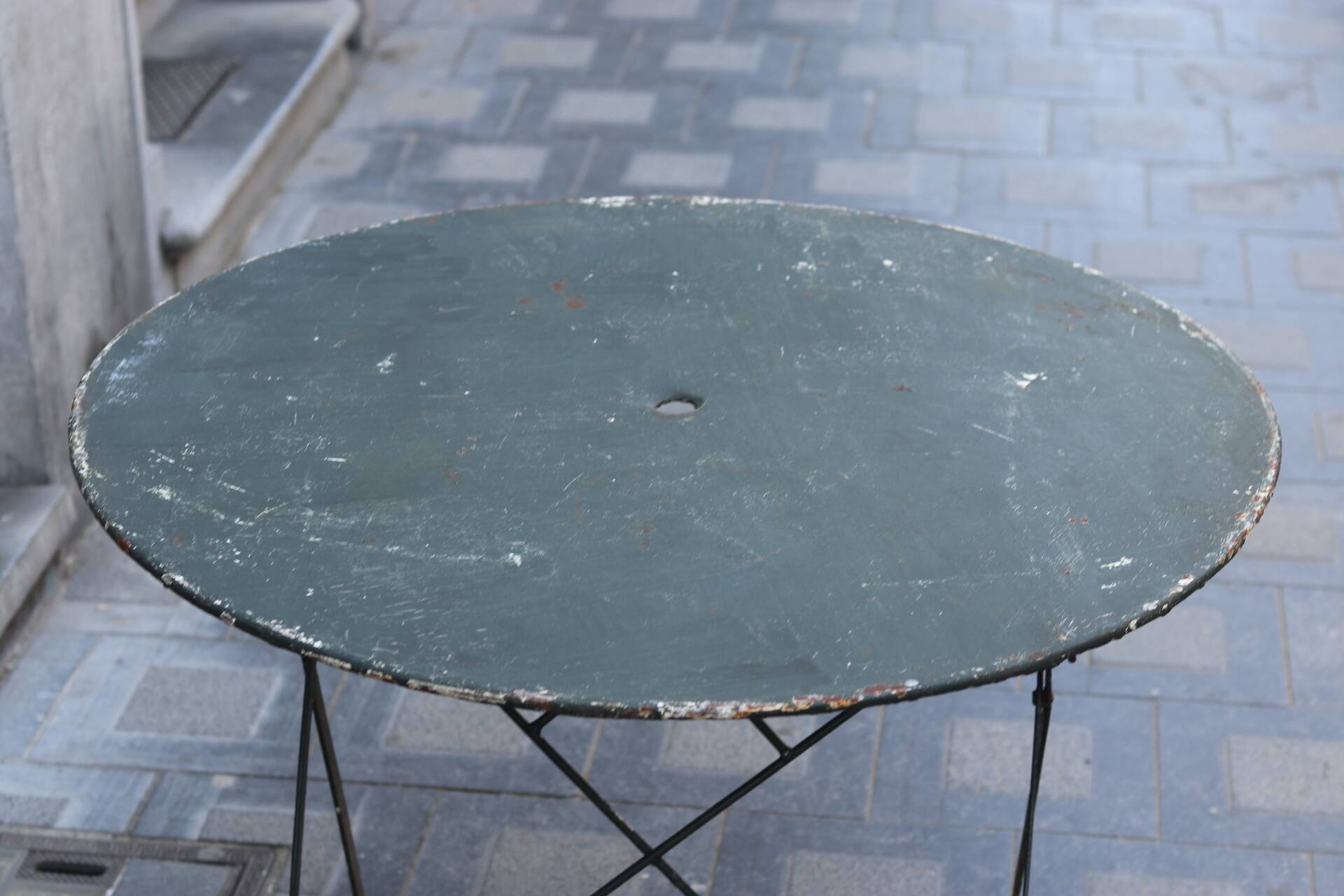 Folding wrought iron garden table