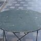 Folding wrought iron garden table