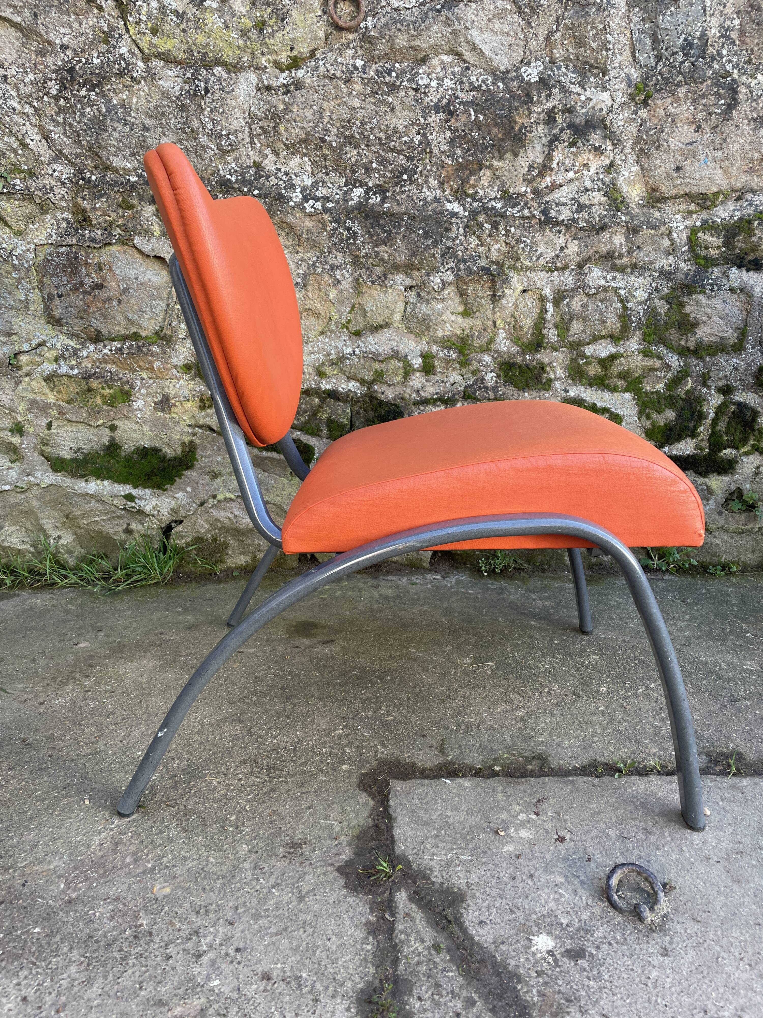 Pair of faux leather armchairs