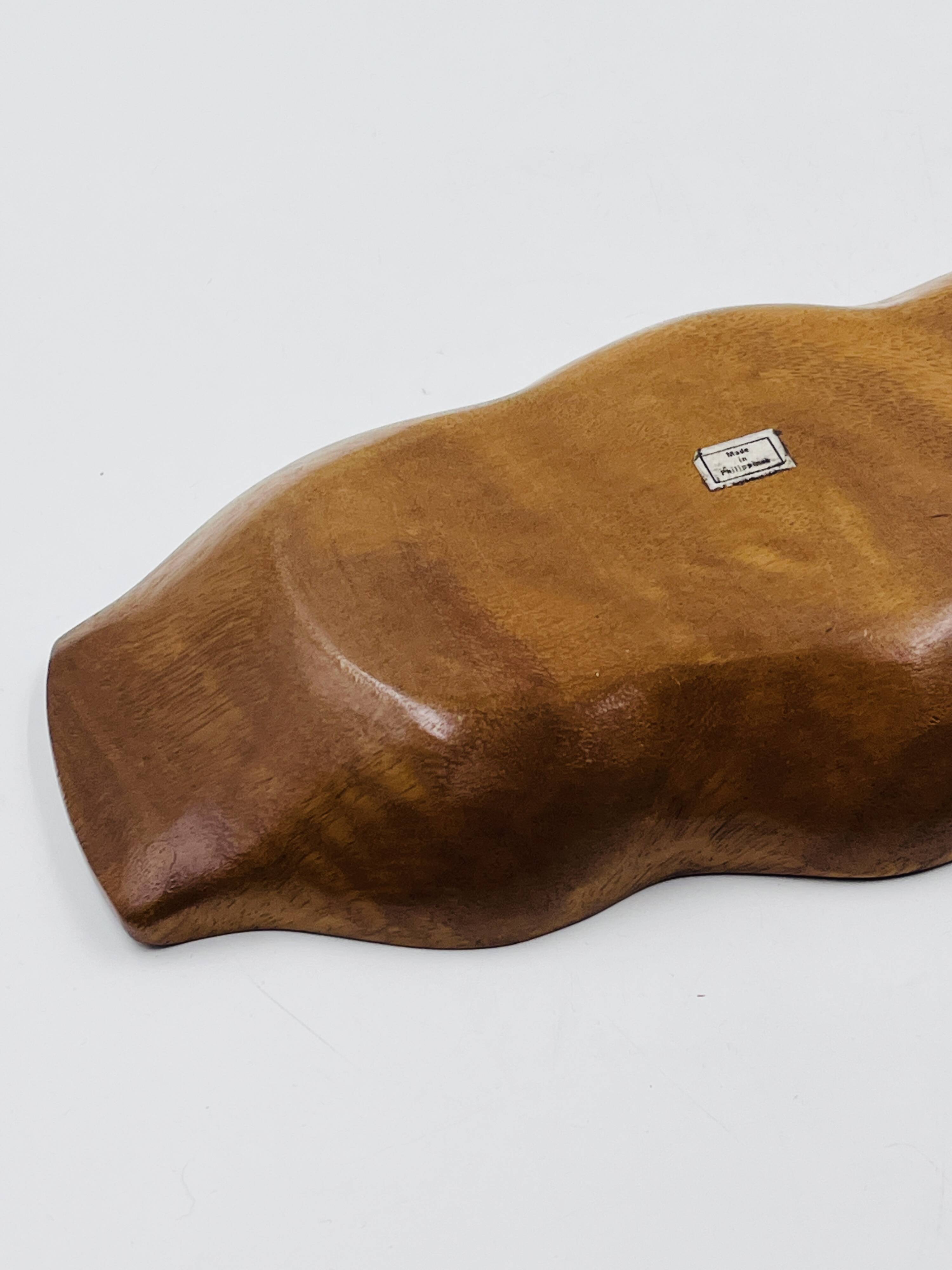 Segmented wooden plateau carved from exotic wood, Asia, 1970s.