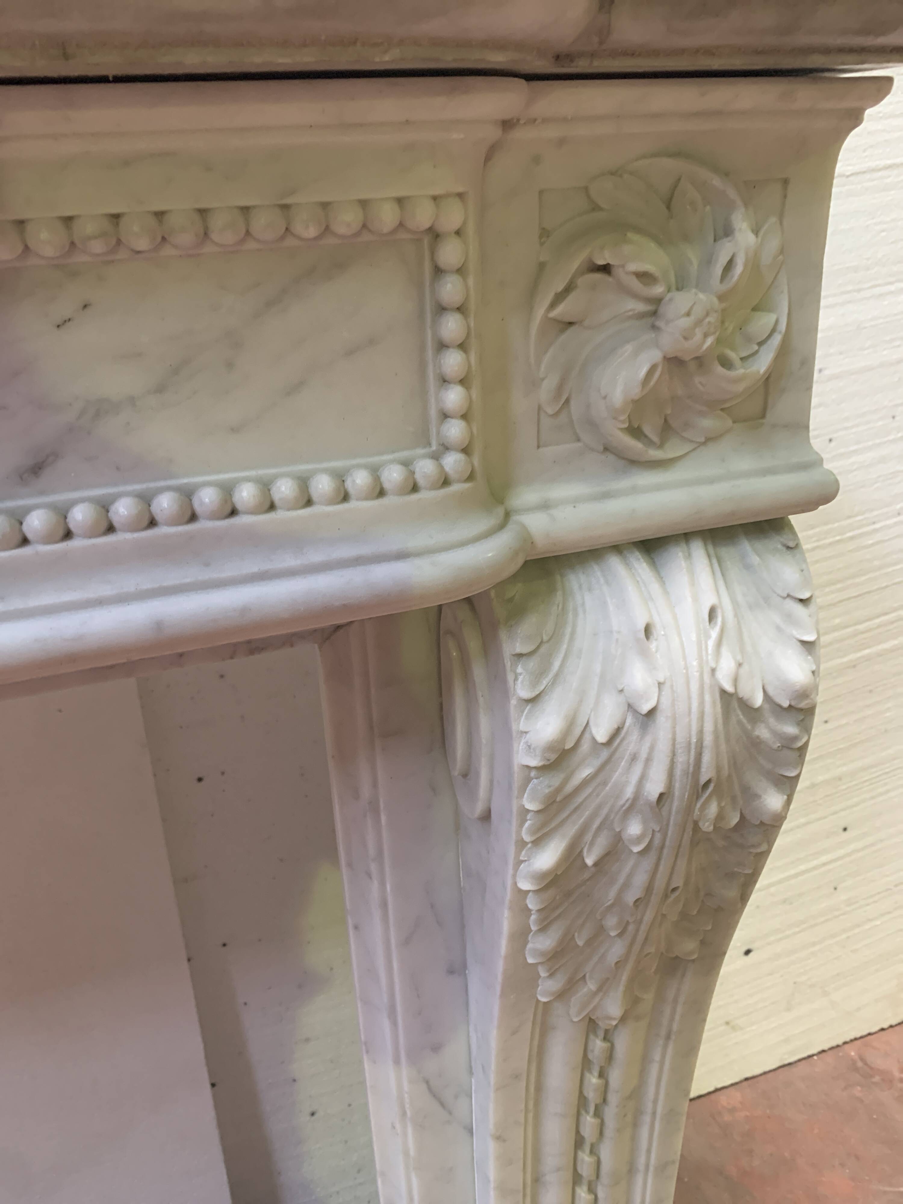 Louis XVI style fireplace in white Carrara marble, 19th century