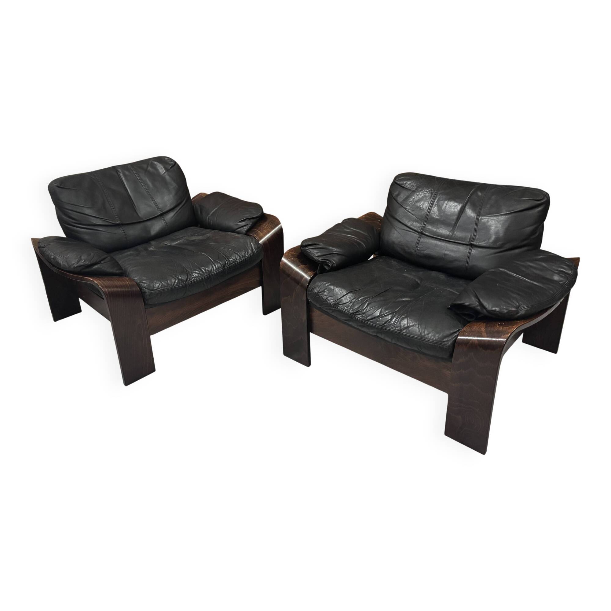 Pair of Scandinavian armchairs in leather and rosewood.