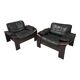 Pair of Scandinavian armchairs in leather and rosewood.
